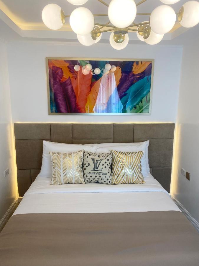 Makati Isabela Luxury Apartment Манила Екстериор снимка